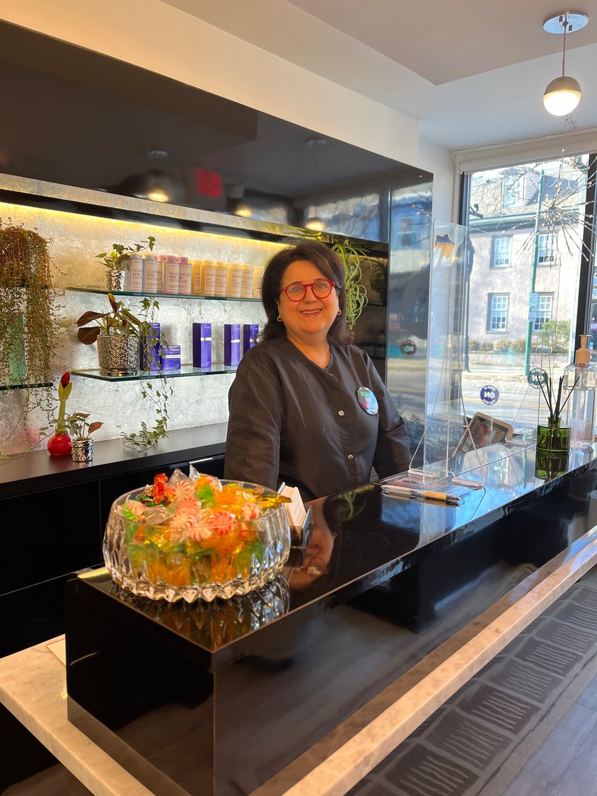 Maryam at the front desk of Salon Maryam